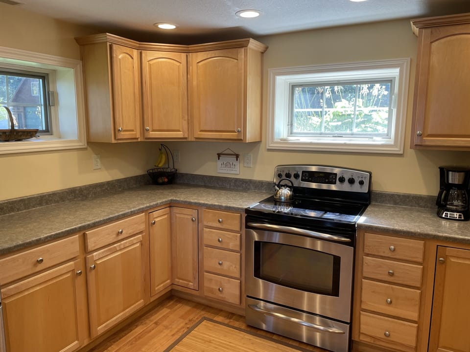 Our well equipped kitchen including a large refrigerator and freezer.