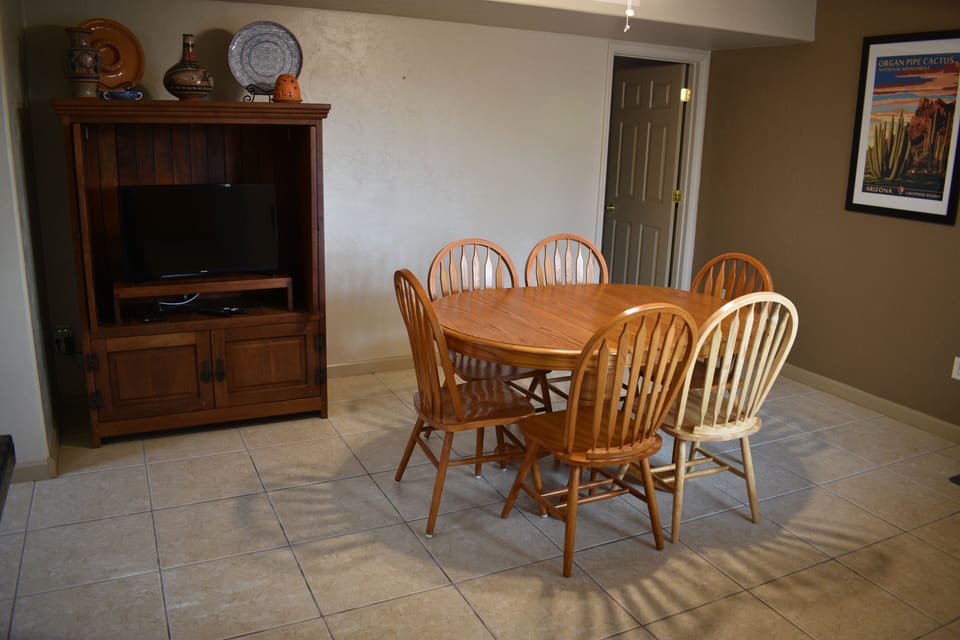 Kitching dining table and TV.