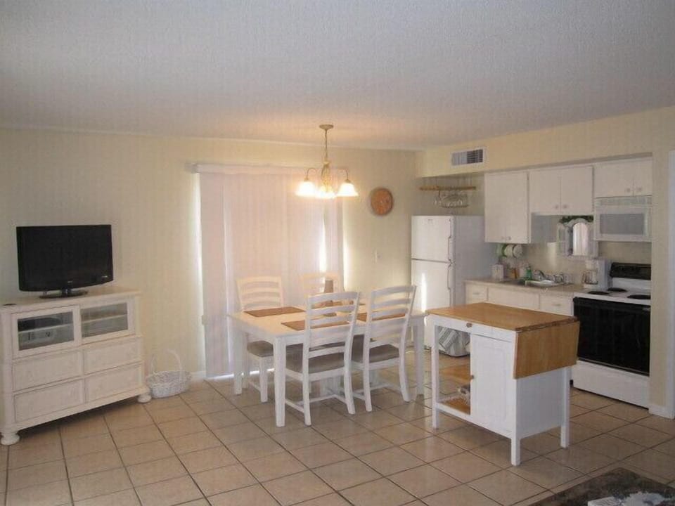 Open kitchen and dining.