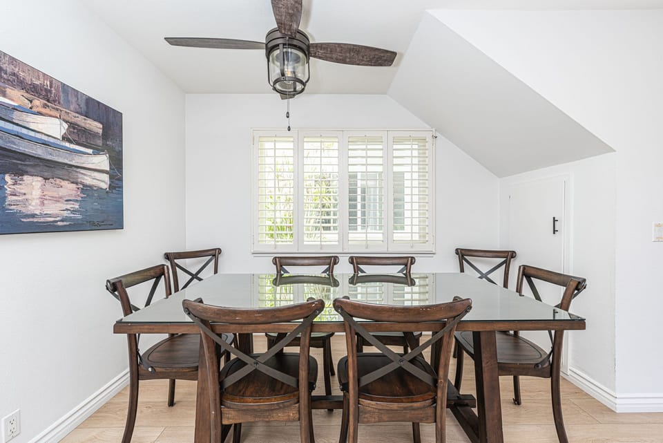 Dining area, adjacent to both kitchen and living areas, is the perfect headquarters for family meals, game night and good conversation.
                