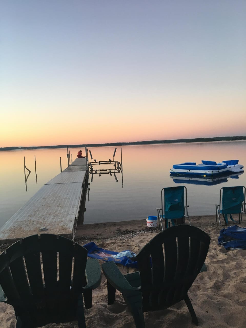 Sunrise over the dock / beach area.