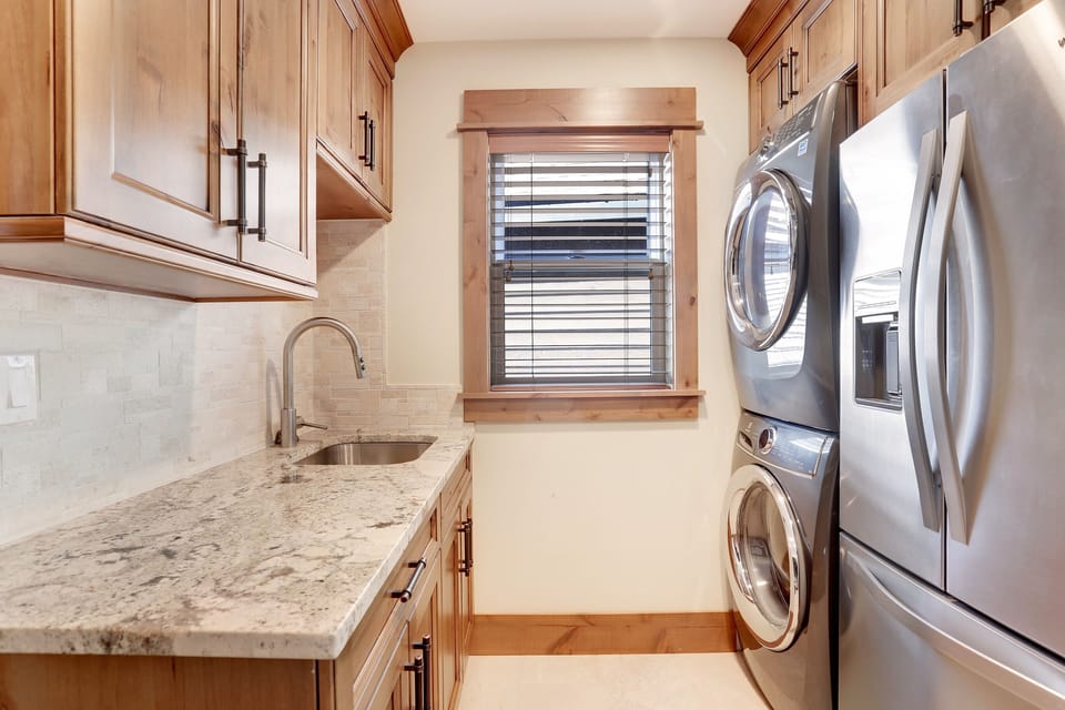 Laundry with second fridge 