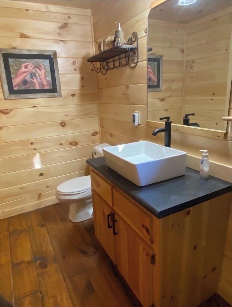 Upstairs bath 3-piece, new sink, new toilet, new counter top, new wood walls