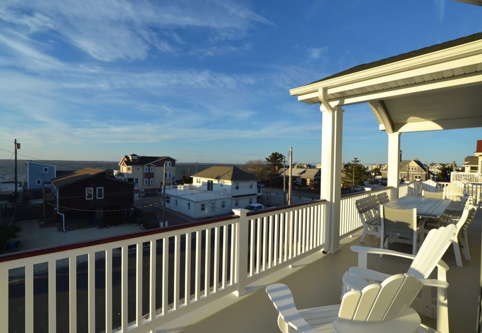 42' Veranda Outside LR, K and Dining Area With View Across Bay