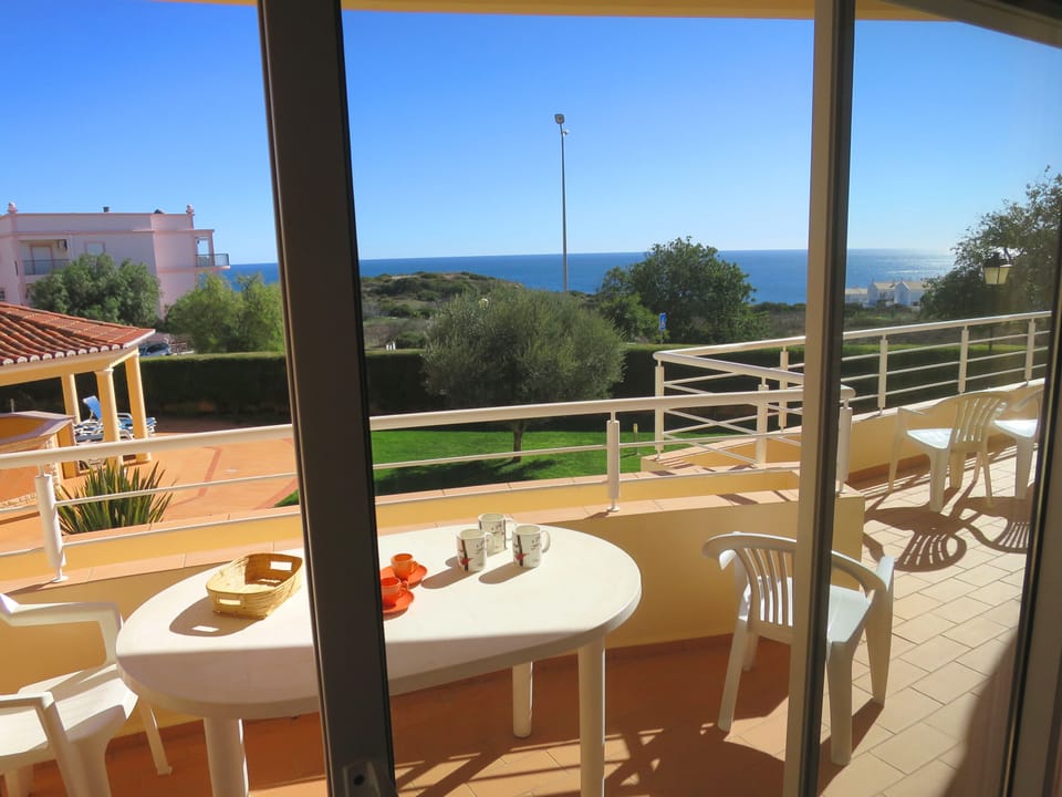 Lounge opens to long veranda with sea views is also accessed from kitchen
