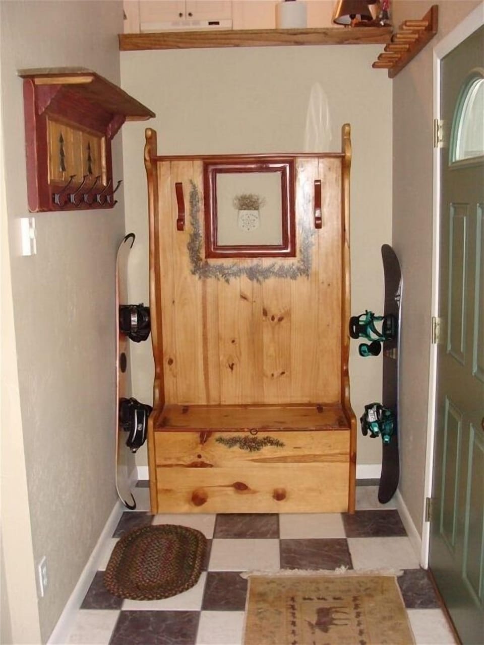 Foyer with bench and ski rack