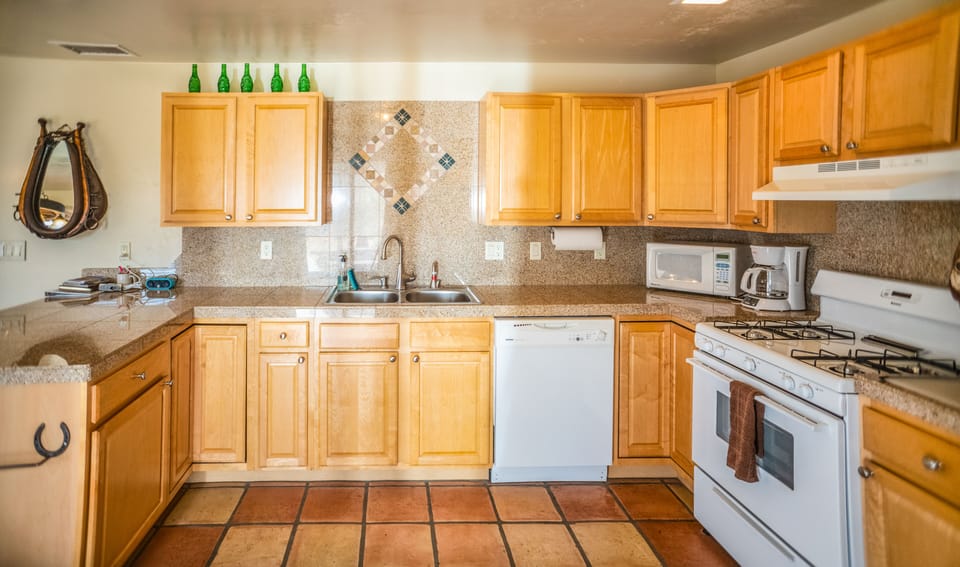 Kitchen is fully equipped including dishwasher.