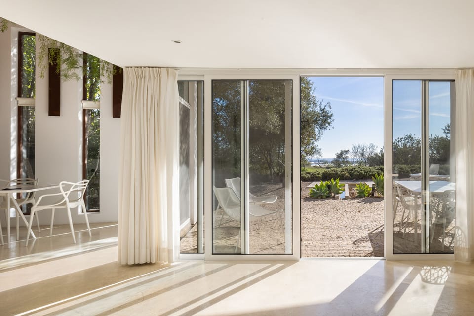 Light floods into the living area, with a sea view to the south.
