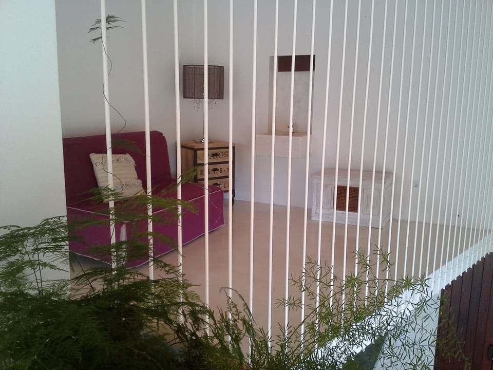 La Forma sofa bed on the mezzanine area, with room for one more person to sleep.
