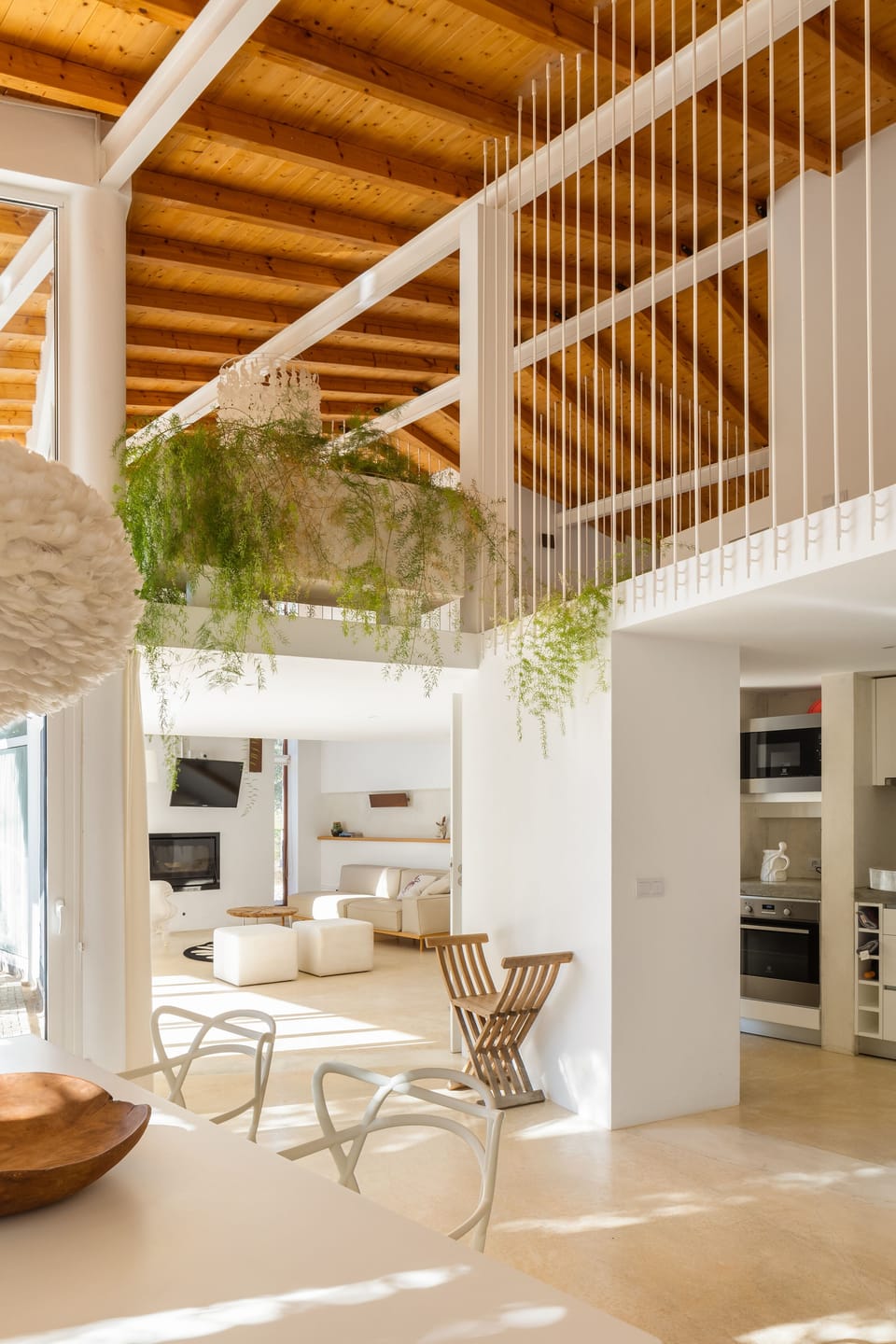Dining area in the foreground, living area in the background.