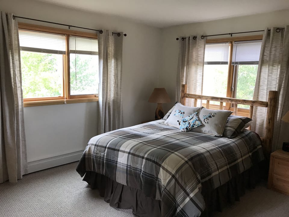 Master queen bedroom with attached bath.