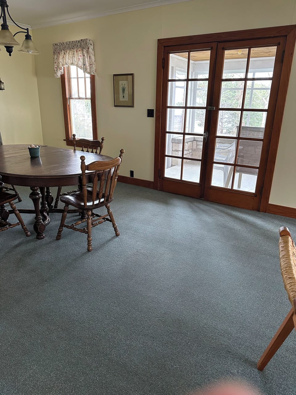 The French doors lead to a wonderful screened porch.