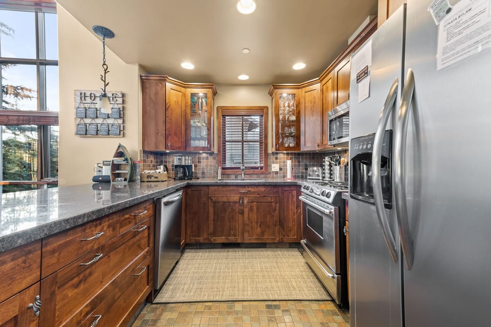 Well stocked kitchen with all you need to entertain, cook, or enjoy take-away