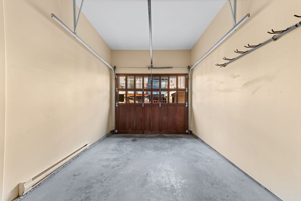 Garage with ski, snowboard, mountain bike storage