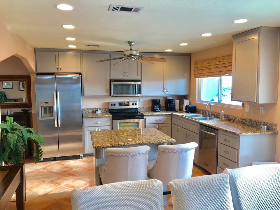 Kitchen with freshly painted cabinets as of August 2018.