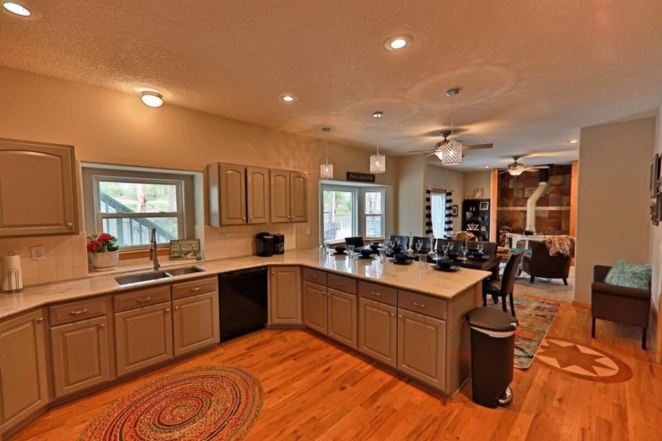 Fully equipped kitchen with granite countertops. 
