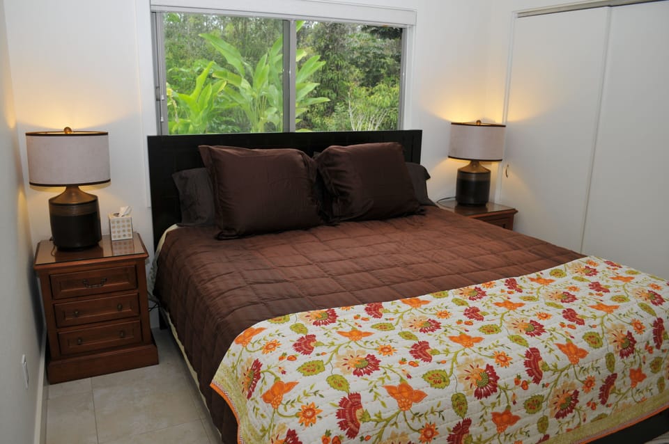 Large bedroom area with comfortable King sized bed.