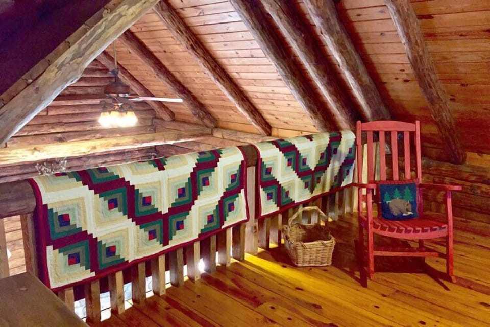 Upstairs loft area; looking out into living area