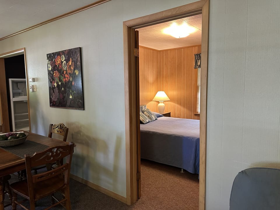 Looking from the living area to one of the queen bedrooms.