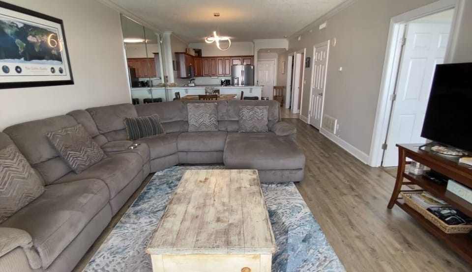 Cozy,  new couch with 2 recliners, a chase and power outlet in couch compartment