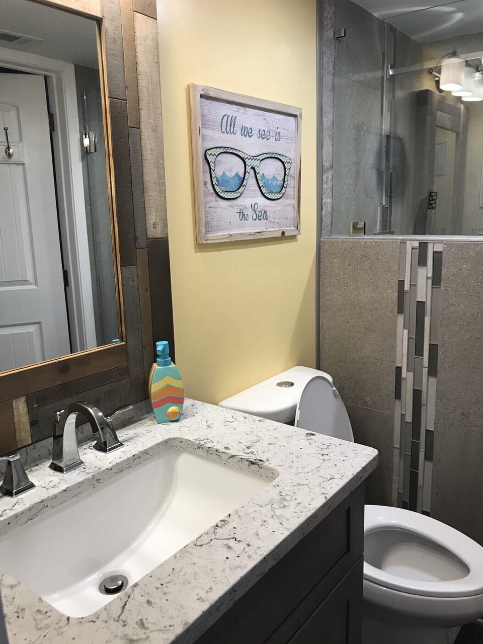 Front guest bath with granite sink and comfort height toilet