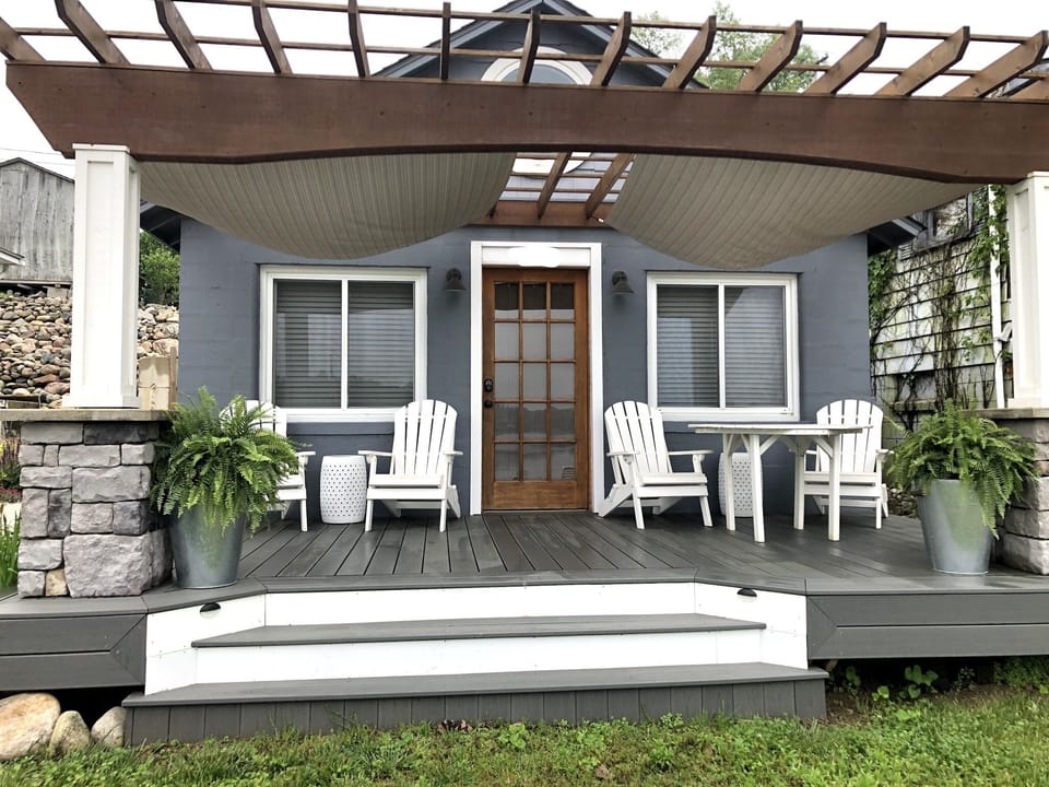 The porch is a place to create memories. Sit back and watch the lake life. 