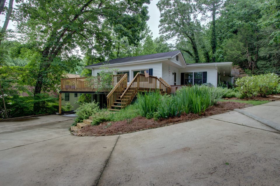 Year round view of lake from large deck, family room & kitchen windows
