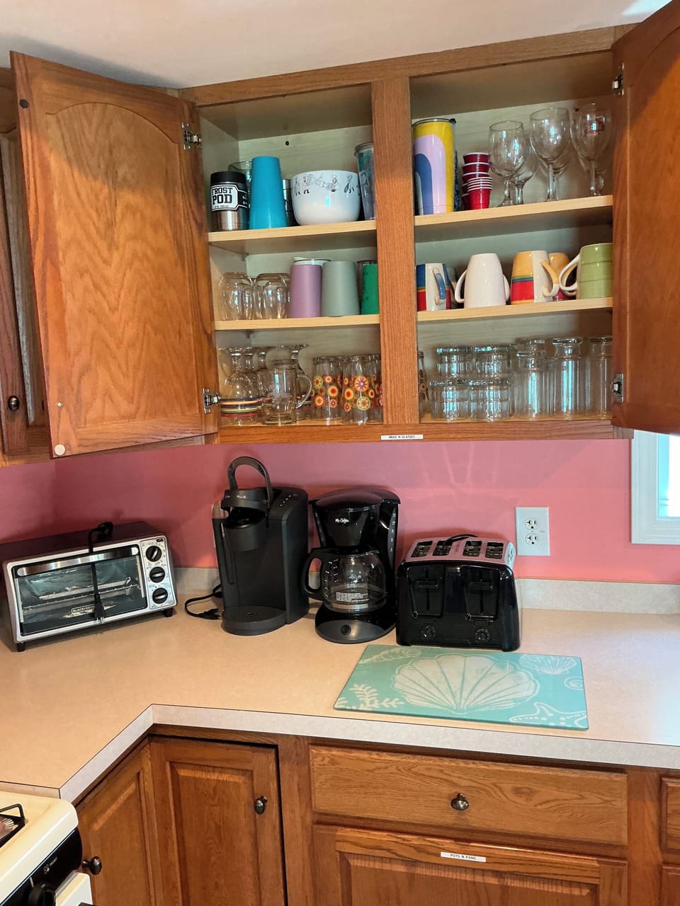  Keurig,  coffee maker, toaster toaster oven.  Plenty of mugs and glasses.