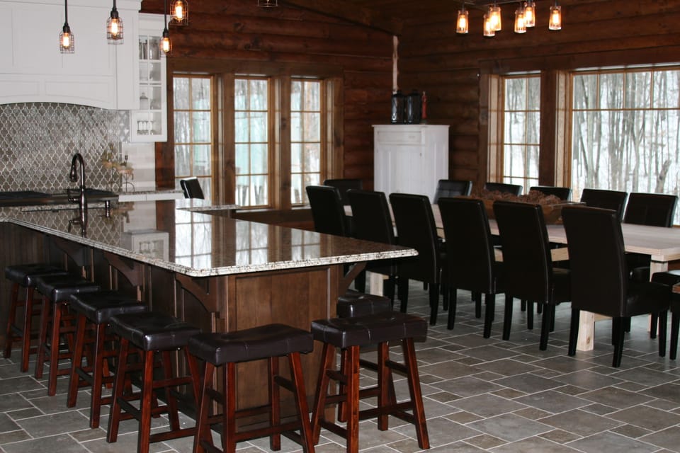 Family Dinner time for 24 = Kitchen seating for 10, Dining room seating for 14