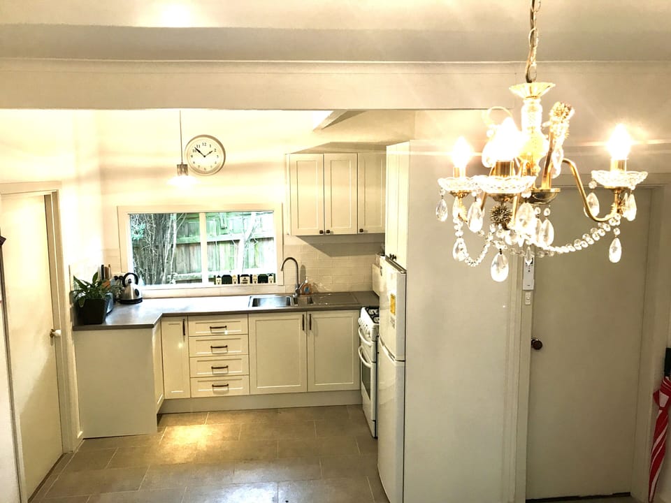 Retro ambience and charm await in this quaint renovated 1920's cottage