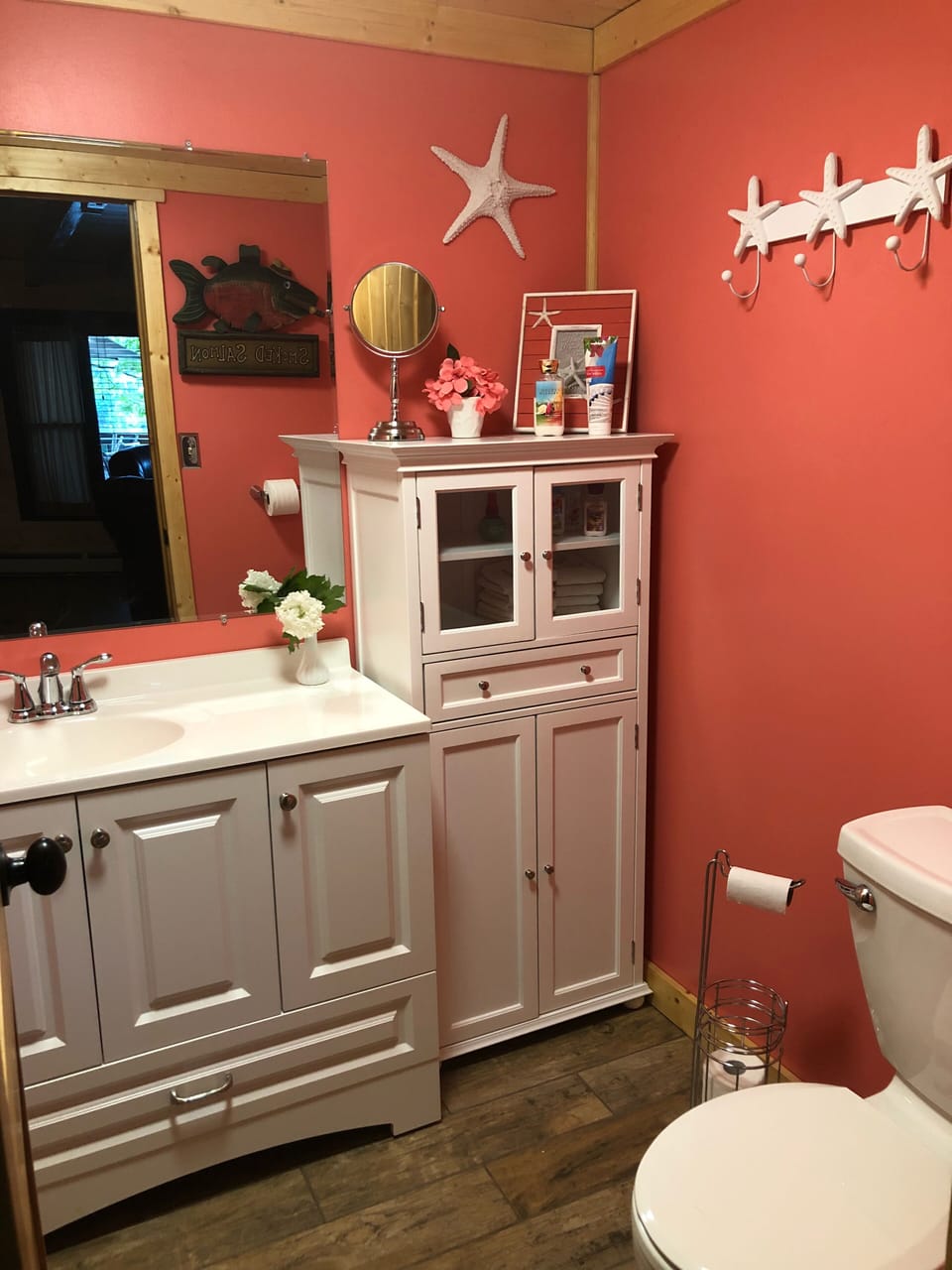 1/2 bathroom toilet and vanity downstairs