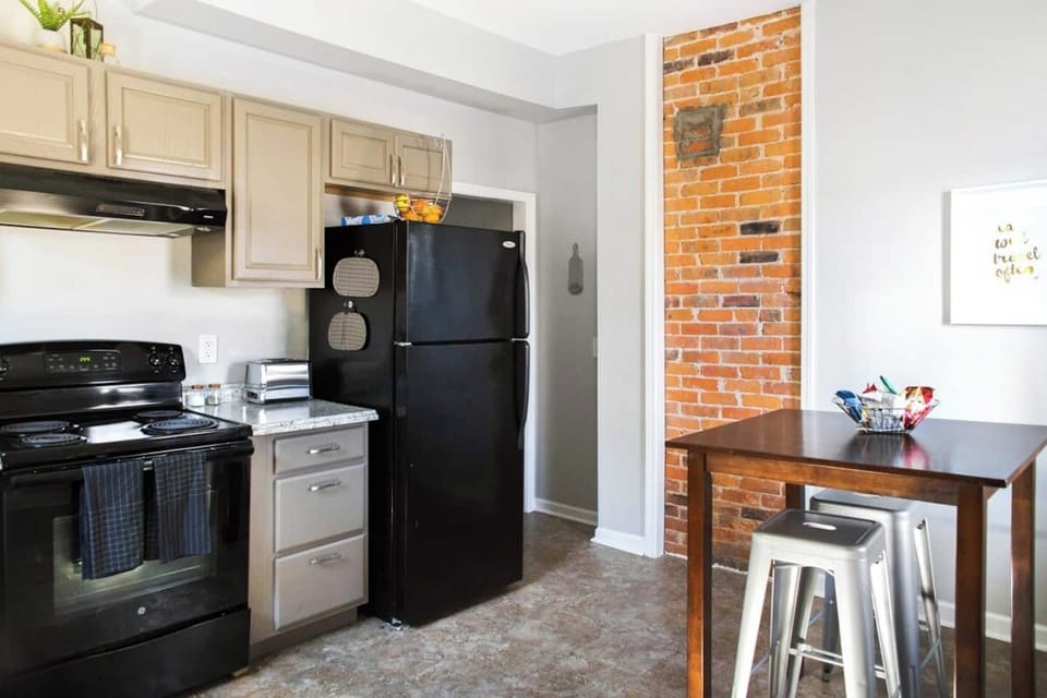 Kitchen with small table and seating for 2.