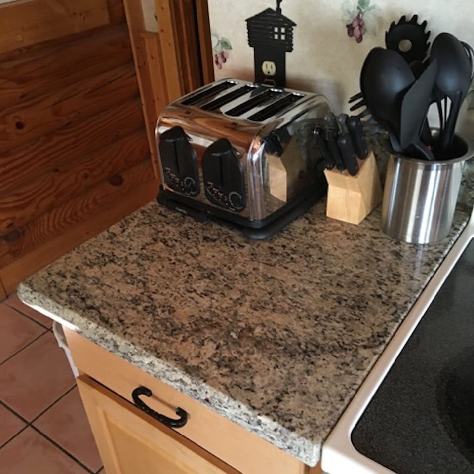 kitchen work area-- small appliances and utensils at the ready