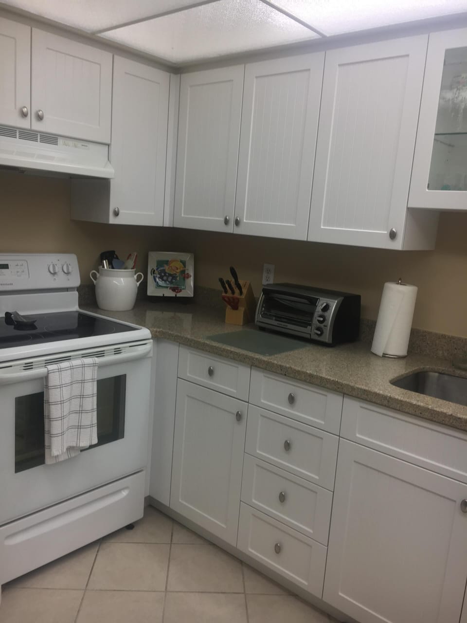Kitchen with stove and oven.