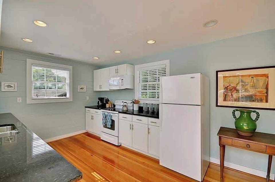 The kitchen is spacious and has everything you'll need.