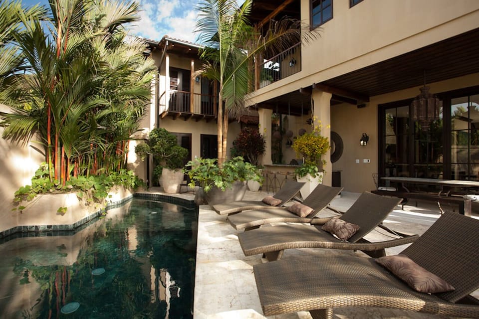 Outdoor private pool with sun loungers