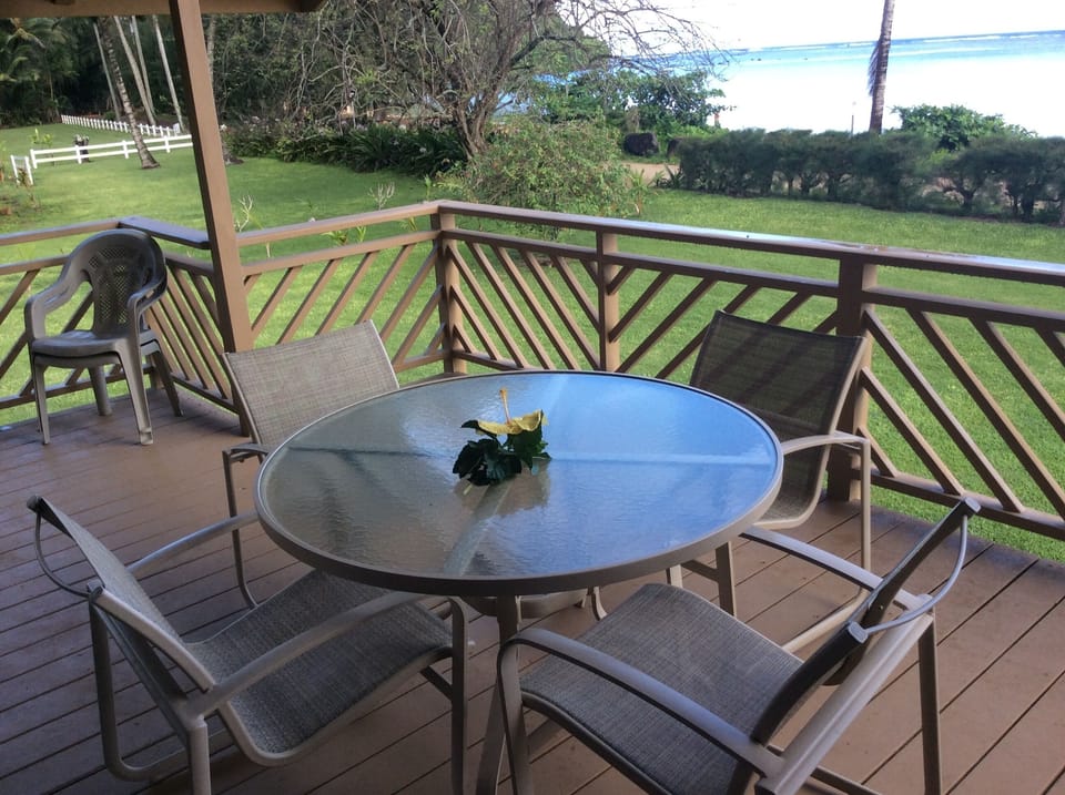 Relax on the deck and enjoy the view of lovely Anini Beach