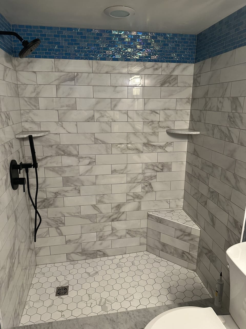Brand new shower installed 2024. Convenient shower wand.