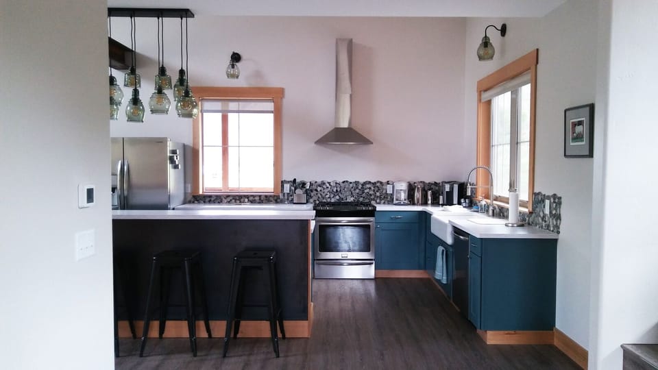 View of kitchen from the foyer. 