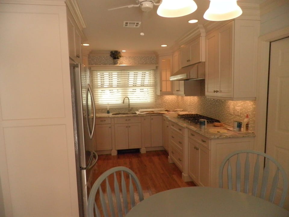Eat-In Kitchen with Granite Counter Tops & Stainless Steel Appliances. 