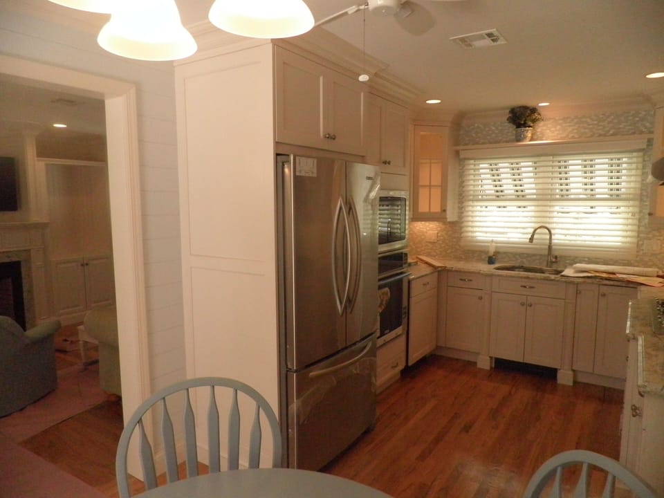 Kitchen with Dishwasher, Wall Oven, Cook Top, Microwave & Under Cabinet Lights. 