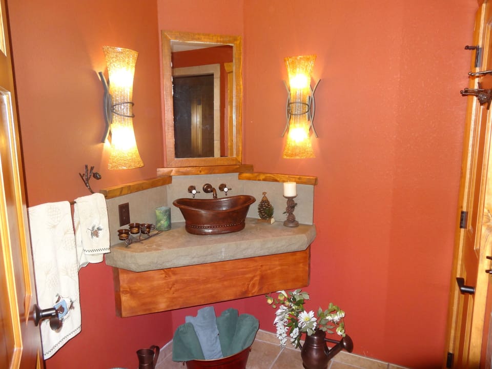 Beautiful spa-like bath #4 in walk-out basement with 6-person steam room/shower.