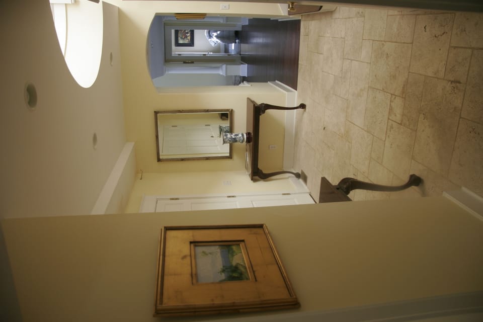 View of Foyer Looking into the Living Room/Den