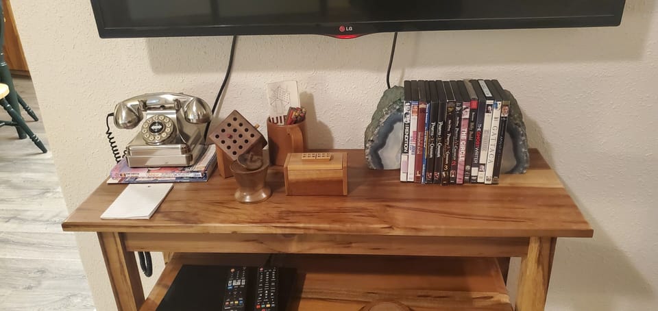 A few DVD movies, games, and puzzles. 