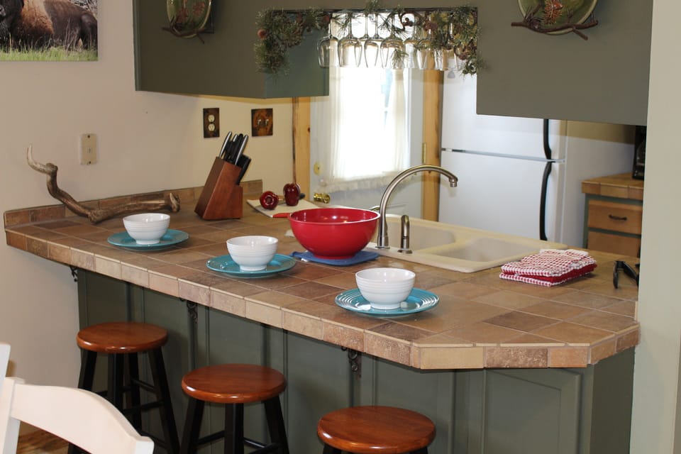 The kitchen and breakfast bar.