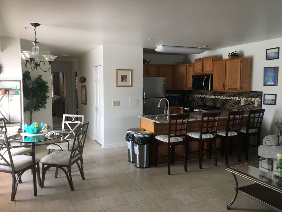 Breakfast bar and dining area seats 8.