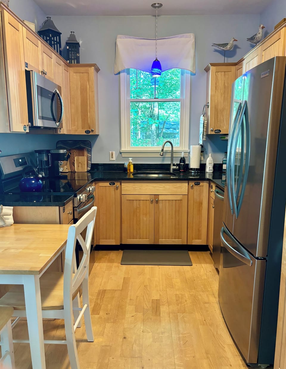 Beautiful kitchen with new full-sized appliances.