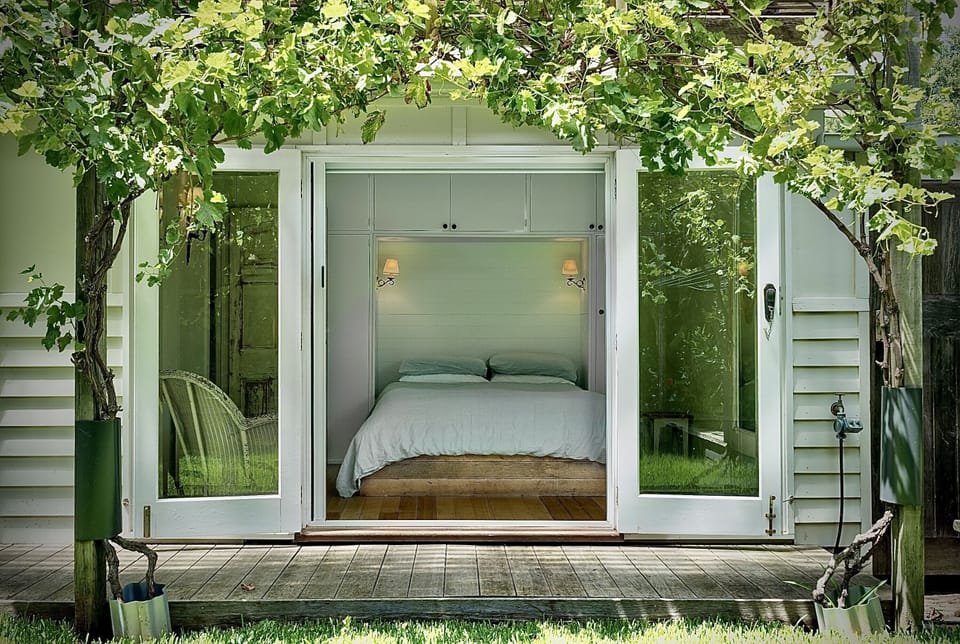 Master bedroom with fly wire door screen, beautiful open at night