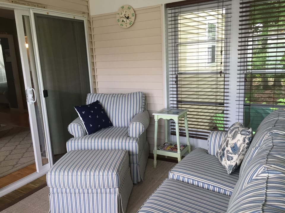 3 season room with pull out couch. Upgraded windows that open and close
