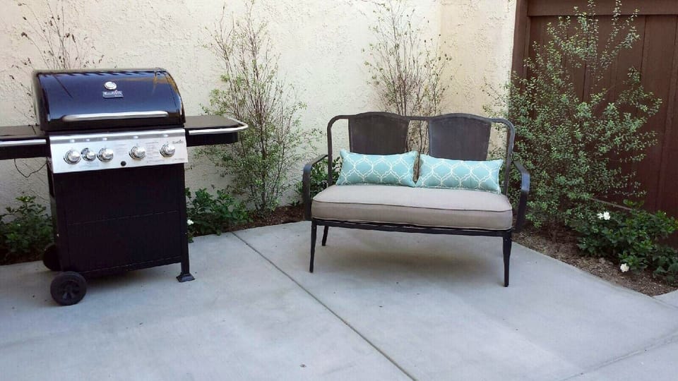 Our beautifully landscaped  patio includes a propane BBQ  